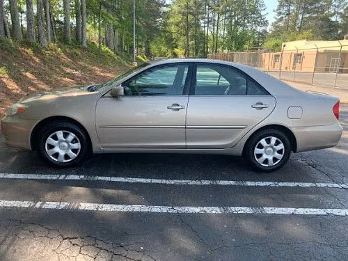 Toyota Camry 2003 года выпуска! Работает отлично! Первоначальный взнос 1500 долларов!