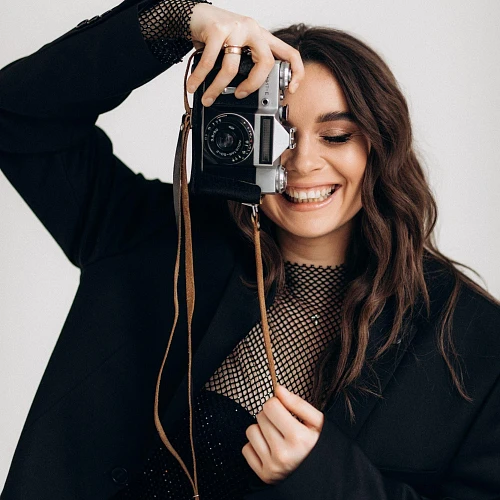 Romana, Photographer